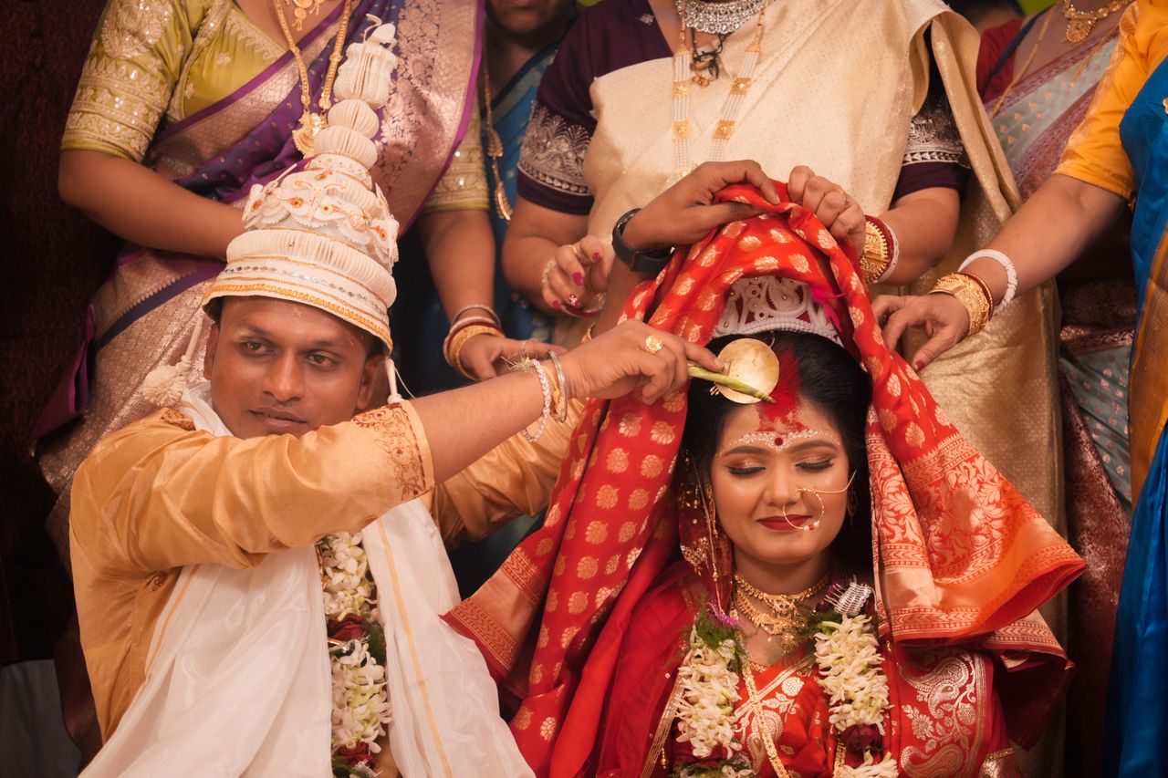 services-02 Colorful Indian wedding ceremony in Kolkata showcasing cultural customs and traditional attire.